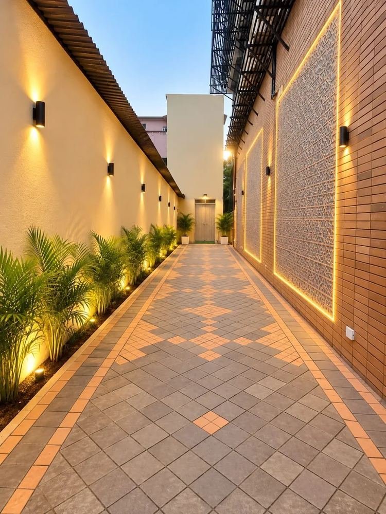 Illuminated walkway at Hotel Vyom Residency